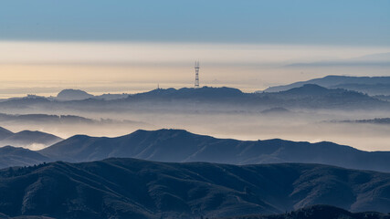 Sutro Tower seen from Mt Tamalpais on a lite foggy morning