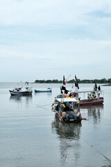 Small fishing boats moored in a port of a Panamanian fishing village