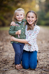 Portrait of two smiling sisters