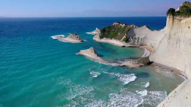 Akra Drastis - Cape Drastis, northwesternmost point of Corfu island, Ionian Island in Greece, aerial drone footage, 4k