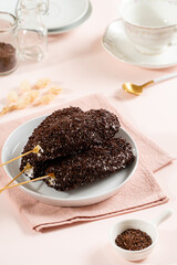Delicious homemade Donat paha ayam, Donat paha ayam is a traditional snack in Indonesia. 

Donuts are shaped like chicken thighs and covered with chocolate sprinkles