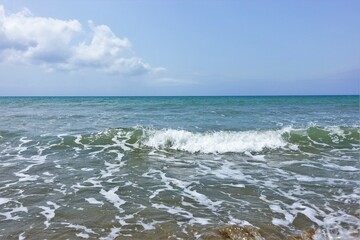 blue sky and sea with waves