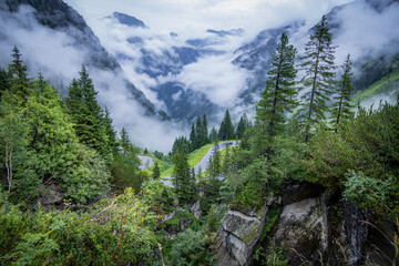 Fototapeta na wymiar Fog in the Austrian Alps on a misty day - travel photography