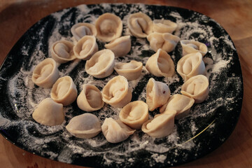 lamb chops on a plate in flour