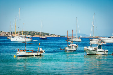 Obraz premium MAJORCA Boats moored in clear Mediterranean waters off the coast