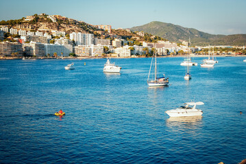Obraz premium MAJORCA Boats moored in clear Mediterranean waters off the coast