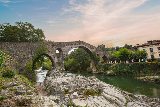 Old Roman stone bridge in Cangas de Onis (Asturias), Spain in a sunny day