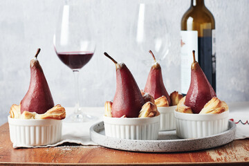 Poached pears in red wine.