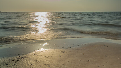 Sunset at sea. Reflection of the sun in the sea.