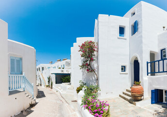 White Houses On Street Of Naousa