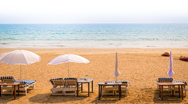 beach chairs and umbrellas