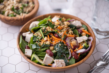 healty salad with chicken and quinoa, red bean, chickpeas