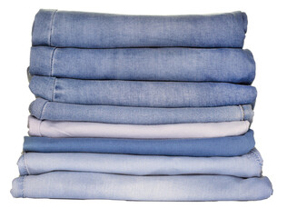 Jeans of various fabrics lie in a pile on a white background, isolate