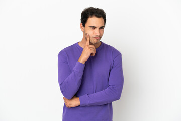 Caucasian handsome man over isolated white background and thinking