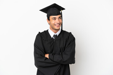 Young university graduate over isolated white background happy and smiling