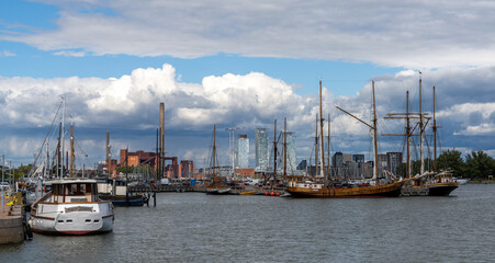 Fototapeta na wymiar many old sailboats moored in the harbor of Helsinki in southern Finland