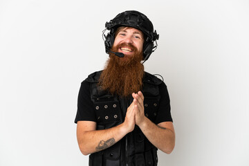Redhead SWAT isolated on white background applauding after presentation in a conference