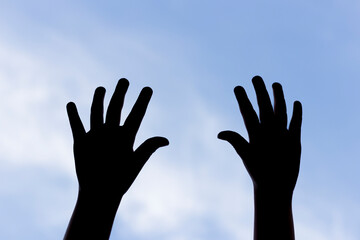 Hands, blue sky