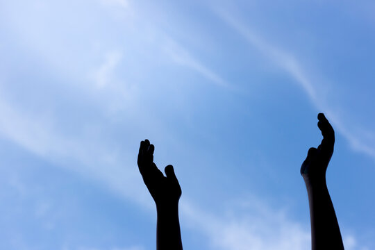 Hands and blue sky