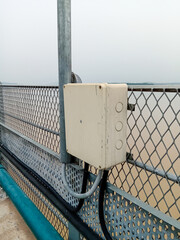 Street light electric box on mandira dam bridge , white electric box