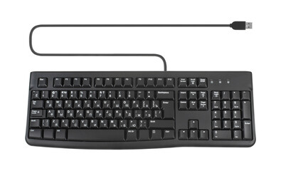 keyboard for a computer, wired with a wire and a connection plug, on a white background isolated