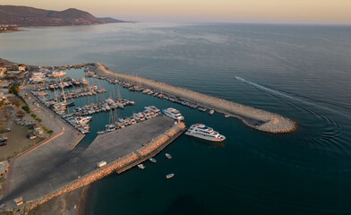 Aerial view of fishing boats and tourist yachts moored at the marina. Latsi harbor Paphos Cyprus
