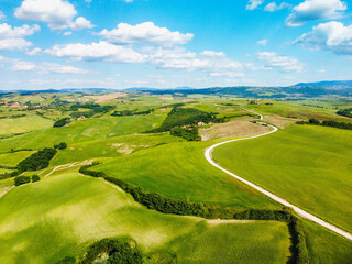 Siena, Italy - aerial panorama of the valleys and towns of the Crete Senesi in Tuscany