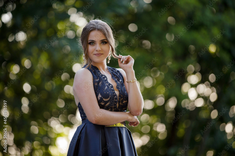 Canvas Prints Beautiful Caucasian female from Bosnia and Herzegovina wearing an elegant blue dress