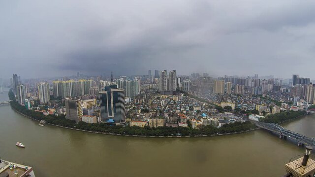 Ultra wide day to night transition time lapse. Huge mega city rain and nightfall timelapse. Evening clouds over major Chinese city with river.