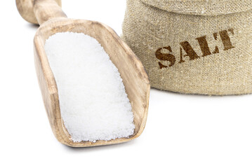 Salt in a sack isolated on a white background. Salt . Salt in a wooden scoop. Salt in a jute bag