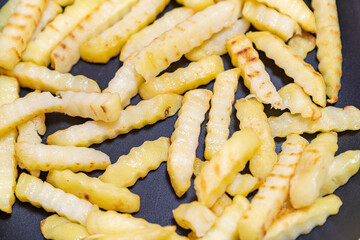 美味しそうなフライドポテトの写真。高カロリーの食べ物の写真。