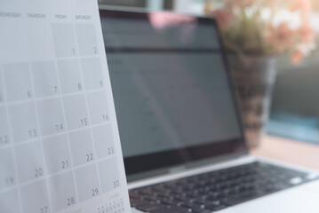 Close up of calendar on the table office, planning for business meeting or event planning concept