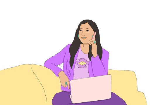 Business woman talking on the phone with laptop on her lap