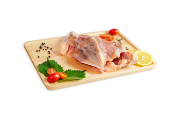 Chicken ribs and spices paste on wooden cutting board.