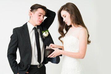 Young bride paying with the groom's money