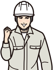 ガッツポーズするヘルメットの男性