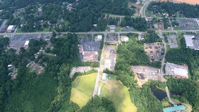 Aerial view of residential district and trees covered landscape in Pittsboro, North Carolina, USA