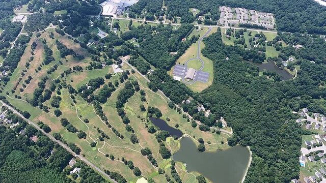 Aerial shot of landscape with golf course and mobile home park in Burlington, North Carolina, USA