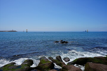 a beautiful seascape with a distant island