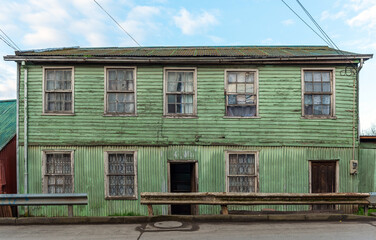 Traditional wood panelling and zinc plates architecture, Castro city, Chiloe Island, Chile.