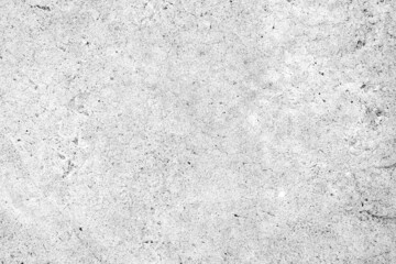 Raw outdoor old cement wall or concrete or plaster wall with stains and cracks for background and street floor texture or vintage background wallpaper.