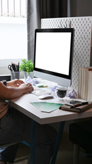 Creative woman working with computer at home office.