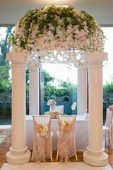 luxury color wedding solemnisation dinner flower florist , dinnerware, cloth and lighting decoration design in hotel and beach