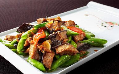Delicious Chinese food, fried mushrooms and meat
