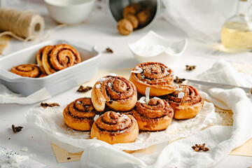 Cinnamon rolls. Cinnamon biscuits witch chocolate. Delicious dessert. 