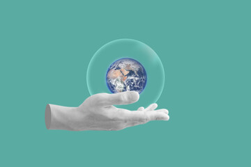 Digital collage modern art. Hand holding globe with bubble. element of this image are furnished by...