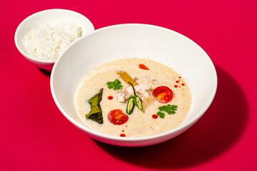 Close up Thai green curry intense soup with chicken