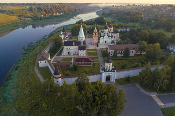 Above the temples of the Staritsky Holy Assumption  Monastery on the early July morning. Tver region, Russia