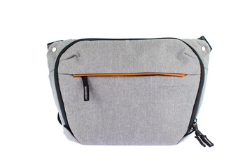Isolated closeup studio shot of new small casual modern trendy fashionable fabric grey messenger...