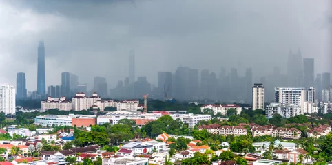 Fotobehang landscape of Kuala Lumpur, Malaysia on 2021, in the day of raining © tanapipat